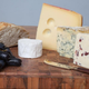 Cheese board with bread and grapes